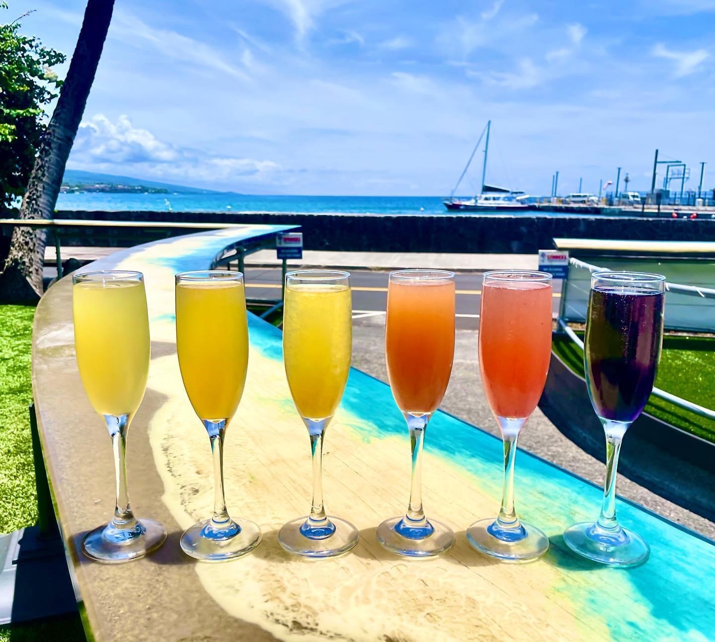 Colorful mimosas on the ocean-view bar